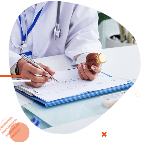 Medical reviewer analysing records at a desk