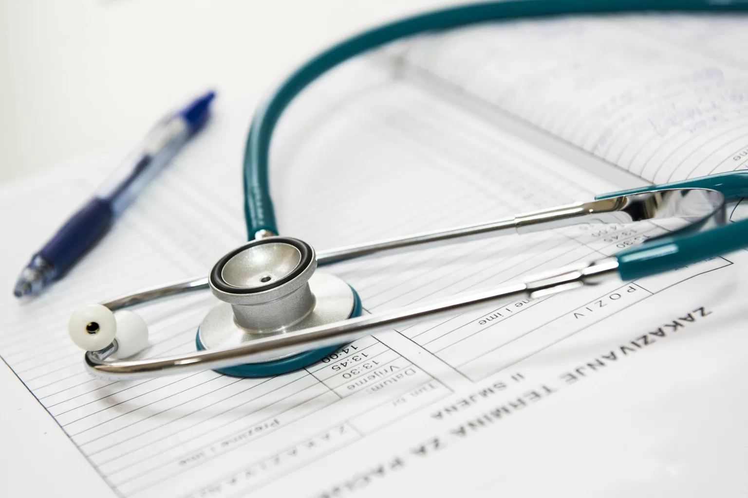 Insurance assessor reviewing medical documentation